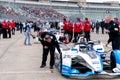 Bmw staff members checking a race car