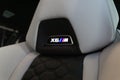 BMW X6 M Competition seat lit up emblem