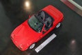 BMW Z1: Aerial view, isolated, red, roadster, year 1988, nobody. The doors retract. It was produced between 1989 and 1991. Royalty Free Stock Photo