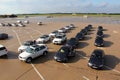 BMWs parked in a disused WWII military air base parked in a parked view.