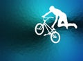 BMX bicyclist silhouette on the blue abstract background Royalty Free Stock Photo