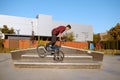 Bmx biker doing trick on stairs in skatepark Royalty Free Stock Photo