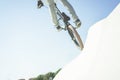 Bmx biker jumping in city skate park outdoor - Young trendy man performing skills and tricks with special bicycle - Extreme sport Royalty Free Stock Photo