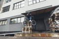 Bmx biker jumping on street