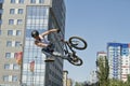 BMX cyclist performs a stunt jump