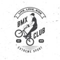 Bmx extreme sport club badge. Vector. Concept for shirt, logo, print, stamp, tee with man ride on a sport bicycle Royalty Free Stock Photo