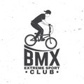 Bmx extreme sport club badge. Vector. Concept for shirt, logo, print, stamp, tee with man ride on a sport bicycle Royalty Free Stock Photo