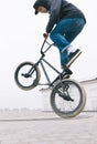 BMX freestyle close up. young man makes stunts on a BMX bike.Street culture Royalty Free Stock Photo