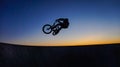 Bmx jump silhouette against sunset at Portugal Royalty Free Stock Photo