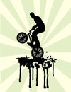 Bmx jump on splash in black and green Royalty Free Stock Photo