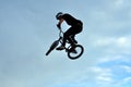 BMX rider making a bike jump Royalty Free Stock Photo