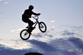 BMX rider making a bike jump Royalty Free Stock Photo