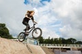 BMX rider over ramp Royalty Free Stock Photo