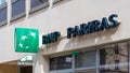 BNP Paribas bank sign and logo outside a bank branch, Paris, France