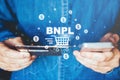 BNPL-Buy Now Pay Later shopping online icon , Online banking businessman using smartphone holding credit card online shopping Royalty Free Stock Photo