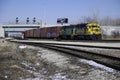 BNSF 2620 diesel in Sante Fe colors followed by a diesel in Burlington Northern colors