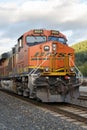 BNSF ES44C4 freight locomotive nose in closeup with name and brand swoosh