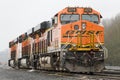 BNSF freight locomotive standing in the rain on a damp day