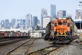 BNSF freight train with the Seattle skyline in the distance