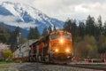 BNSF intermodal freight train as darkness falls in Skykomish