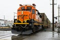 BNSF locomotive working in the pouring rain in closeup