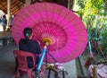 Bo Sang village, handmade umbrellas and parasols, unidentified woman at work at the umbrella making centre Ban Bo Sang, Chiang Mai