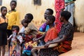 Unidentified Ghanaian people sit on the sangar in the local vil Royalty Free Stock Photo