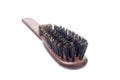 Boar bristle hairbrush on white background Royalty Free Stock Photo