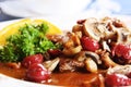 Boar stew with mushroom and cherry