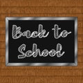 Board with chalk, back to school, wooden background