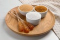 Board with different types of sugar on white table, closeup Royalty Free Stock Photo