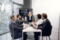 Board of diverse multiethnic directors business people at annual meeting in office room, listening mature blond lady and Royalty Free Stock Photo