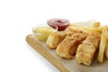 Board with fried fish and chips, and sauces isolated on white background