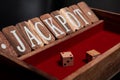 Board game for bars with wooden dice cubes and tiles with jackpot inscription, Shut the box dice rolling solitaire is traditional Royalty Free Stock Photo