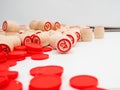 Board game bingo. Wooden barrels with lotto numbers, playing cards for the game.