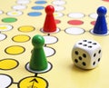 Board game and dice Royalty Free Stock Photo