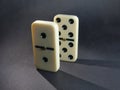 Board game Domino. Bones. The domino principle. Royalty Free Stock Photo