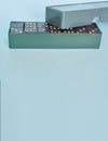 Board game. Domino. Dice in a box Royalty Free Stock Photo