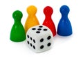 Board game figures and dice Royalty Free Stock Photo