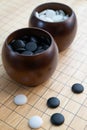 Board game `iGO` - strategy board game with black and white stone