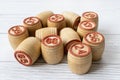 Board game lotto. Wooden barrels isolated on a white wooden background Royalty Free Stock Photo