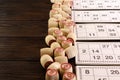 Board game lotto with wooden barrels. Lotto cards. Bingo games. Gambling Royalty Free Stock Photo