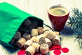 Wooden lotto barrels with bag, game cards, red chips and cup of coffee Royalty Free Stock Photo