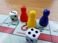 Board Game Pawns And Dice With Colored Pieces Royalty Free Stock Photo