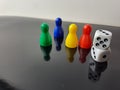 Board Game Pawns And Dice With Colored Pieces Royalty Free Stock Photo