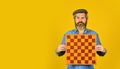 Board game. Thoughtful bearded man play chess. Chess figure. Intellectual game. Enjoy tournament. Grandmaster player