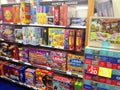 Board games and puzzles in boxes for sale.