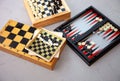 Board games on the table. Chess, backgammon, checkers. Boards are laid out for the game. Play, have fun at home. Leisure, hobbies