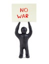 Board no war.A man with a poster no war. Peaceful protesters. Figurine with a poster