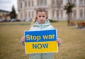 Board No war, Stop war. Little Ukrainian patriot. Ukrainian geopolitics globe crisis